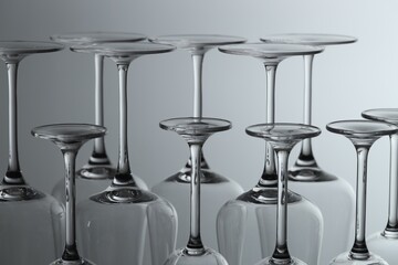 Clean glasses on light grey background, closeup