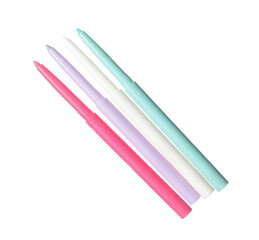 Bright twist up eye pencils isolated on white