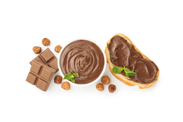 Tasty chocolate spread with mint in bowl, toast and hazelnuts isolated on white, top view
