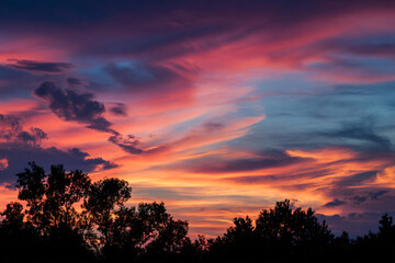 Fototapeta premium 015-049-Clouds-490-Silhouette_of_clouds_lit_by_a_colorful_sunset._-
