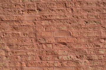 Una pared de ladrillo antigua