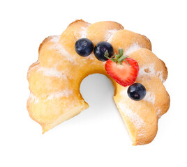 Tasty bundt cake with powdered sugar and berries isolated on white, top view