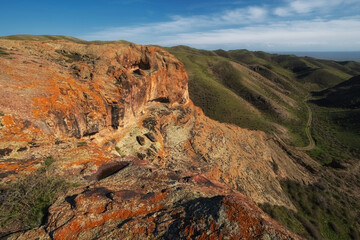 Fototapeta premium The Old Malaysary Mountains are a steppe ridge overlooking the Kapchagay Reservoir in the Almaty Region of Kazakhstan.