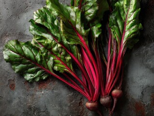 Vibrant red beetroots with lush green leaves, a healthy and visually appealing image.