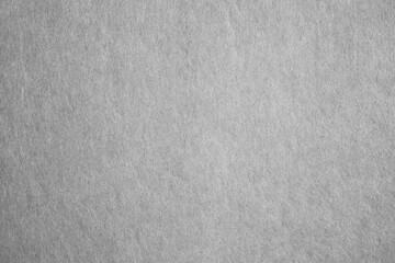 Dark grey grainy kraft paper with fibers texture