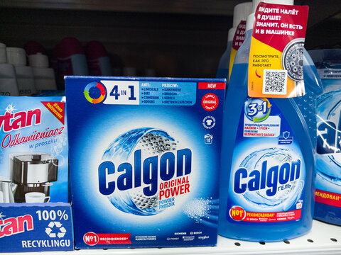 Cleaning products displayed on retail shelf at modern supermarket