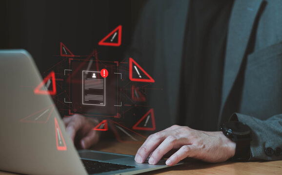 Close up shot of people point to access to personal data and document with warning sign as concept of data breach or attack from hacker or spyware. Data security concept.