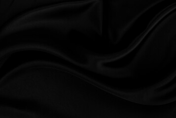 Black gray satin dark fabric texture luxurious shiny that is abstract silk cloth background with patterns soft waves blur beautiful.
