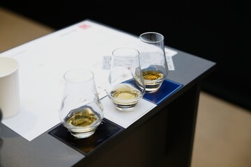 Whiskey tasting event showcasing unique flavors in glass tumblers