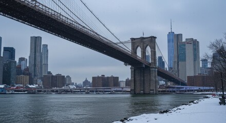 Brooklyn bridge connecting cityscapes, reflecting urban infrastructure and winter season