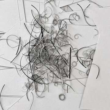Black and White Paper Curls, paper shavings, abstract minimal background composition
