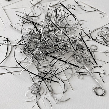 Black and White Paper Curls, paper shavings, abstract minimal background composition