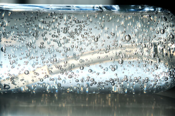 Tube of micellar gel in a ray of sunlight.