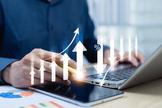 Success of business strategy Cost and quality control for effective management Achieving goals businessman analyze growth and cost reduction graphs Success of business growth for long-term investment. - Powered by Adobe
