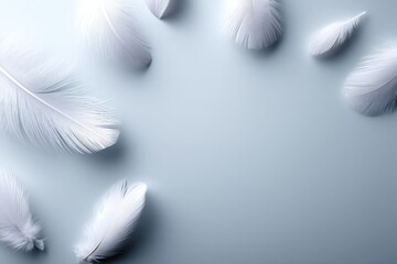 Obraz premium Scattered down feathers create a soft and inviting background with ample space for text or design elements