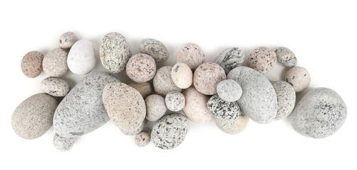 Sea washed oval pebbles isolated on white background. Arrangement of smooth round stones.