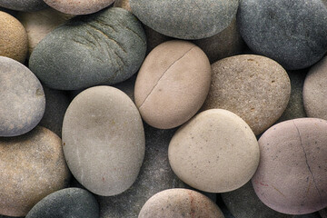 Pebbles. A background of sea stones. Close up.