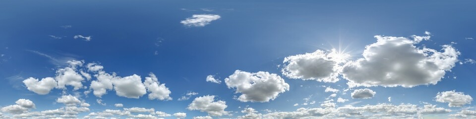 360 hdri panorama of seamless cloudy blue sky with zenith and beautiful clouds before sunset for use in 3d graphics or game development as sky dome or edit drone shot