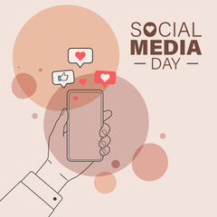 Hand using phone with hearts, concept for Social Media Day