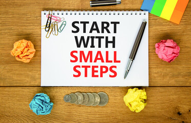 Start with small steps symbol. Concept words phrase Start with small steps on beautiful white note....