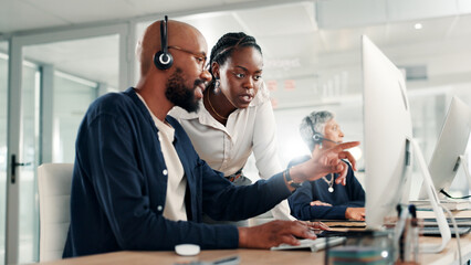 Call center, people and discussion at computer for business, feedback or problem solving in telemarketing. Sales agent, mentor and advice at tech with help, training or pointing in coworking space