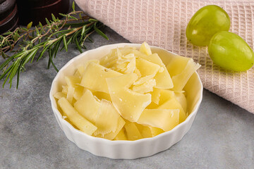 Parmesan cheese slices in the bowl