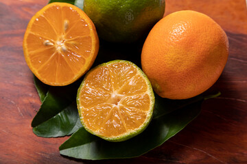 Rangpur, Citrus × limonia or Citrus reticulata × medica, sometimes called the rangpur lime, mandarin lime or lemandarin, is a hybrid between the mandarin orange and the citron.