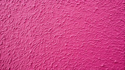 Pink textured wall surface close up showing detailed rough coating and architectural structure