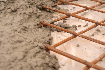 Pouring The Reinforced Floor With Concrete