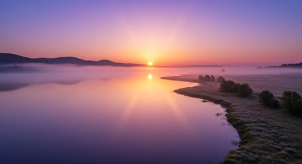 Purple and Orange Sunrise over Misty Lake