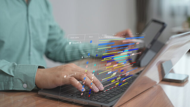 Businessman planning strategy on digital interface with colorful data flow – Concept of project planning, business roadmap, and performance management.