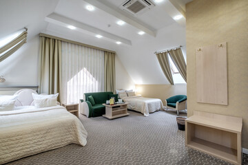 Interior of modern luxure bedroom in studio apartments or hotel with double master bed