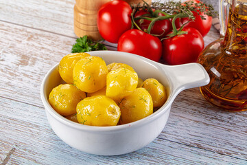Boiled young potato with oil