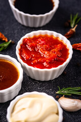 Set of different sauces. Ketchup, mustard, pesto