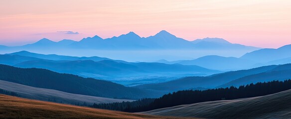 Obraz premium Misty Mountain Range at Dawn