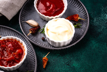 Set of different sauces. Ketchup, mustard, pesto