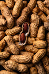 Fototapeta premium Pile of peanuts with one shell open