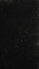 Fototapeta premium Old dark grunge paper texture with scratches, grain and white dust particles
