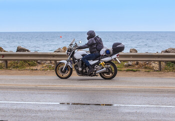 Motorcyclist on a motorcycle on a tourist trip