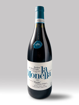 Italy - April 21, 2025: bottle of Barbera del Monferrato, Italian sparkling red wine, La Monella from Braida winery on white background with clipping path included