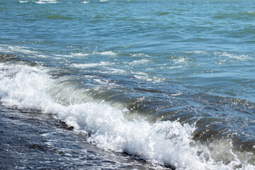 The ocean is calm and the water is blue