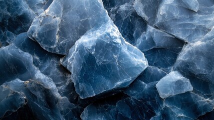 Obraz premium Abstract Blue Stone Texture Close-Up of Rough, Jagged Glacial Rock Fragments