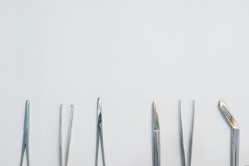Set of Surgery Instrument over white background. Include Scissors and forceps. Medical equipment kit