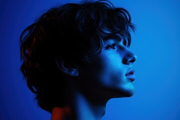 Thoughtful Half-Face Silhouette of a Young Man, Pensive Profile in Dark Tones