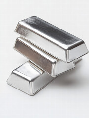 Silver Bar Stack: A close-up captures the pristine beauty of silver bars, neatly stacked. The light plays off the smooth surfaces, creating a sense of value and enduring investment potential.