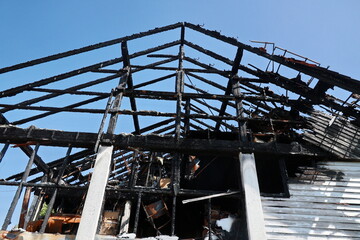 A building with a black roof and a black interior