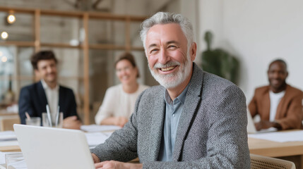 
Senior Businessman Enjoys Collaborative Team Meeting Success
Positive Leader Inspires Diverse Workplace Innovation Together