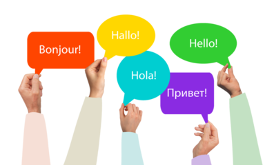 Hello speech bubble with multilingual greetings. Word HI in English, Spanish, French, Chinese,