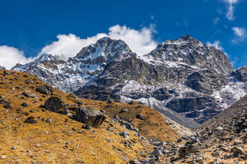 Mera Peak high altitude mountain summit ascent in Himalayas. Stunning views above the clouds at sunrise from the top of the mountain. Alpine route climbing on the snow path in Himalayas