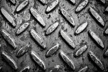 High Contrast Aluminum Tread Plate Background with Textured Surface Ideal for Industrial and Modern Design Projects